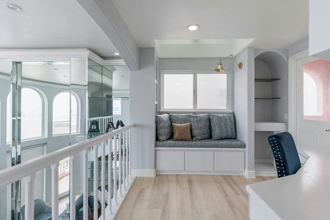 You Arrive in Your Dedicated Office Space Stay productive in this bright and comfortable workspace with ocean views.