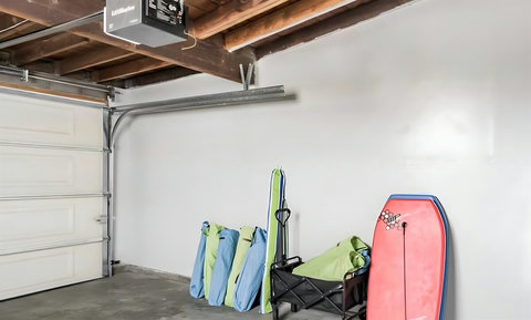 Garage loaded with beach chairs, boogie boards, and an umbrella, plus a washer/dryer to keep your vacation easy and clean.