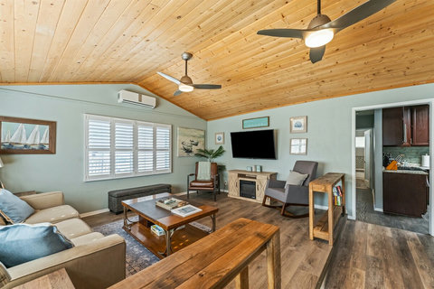 Stylish and relaxed, this living space is perfect for movie nights, morning coffee, or just kicking back.