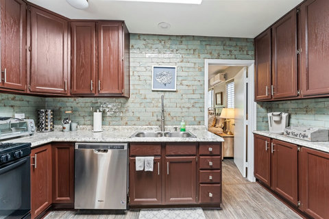 Kitchen Essentials Whip up meals with ease in a fully stocked kitchen—pots, pans, dishes, and a spice rack are all here to inspire your inner chef.
