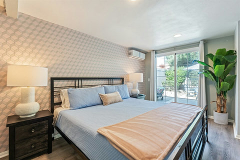 King Suite Comfort Relax in the spacious king bedroom with a Roku TV, private sliding door to the backyard, closet, and mini split AC/heat for year-round comfort.