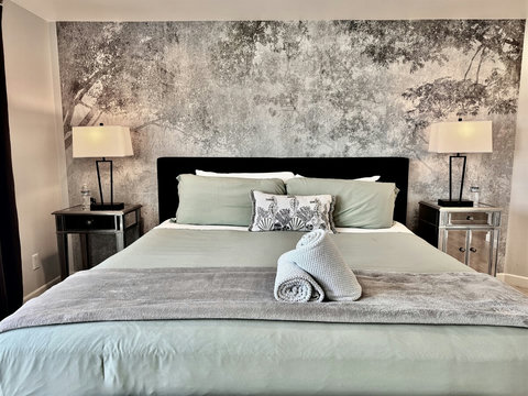 Spacious king bedroom with ensuite bathroom and natural light