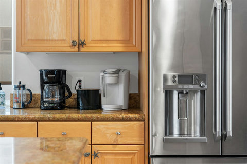 Sleek design meets practicality in this fully equipped kitchen