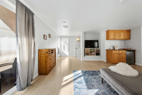 Third-floor family room with a sleeper sofa – a versatile space for extra guests