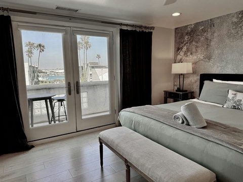 Spacious king bedroom with ensuite bathroom and natural light