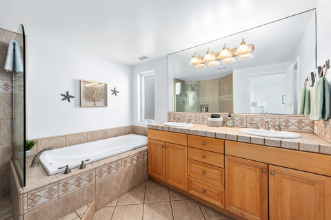 Spacious king bedroom with ensuite bathroom and natural ligh