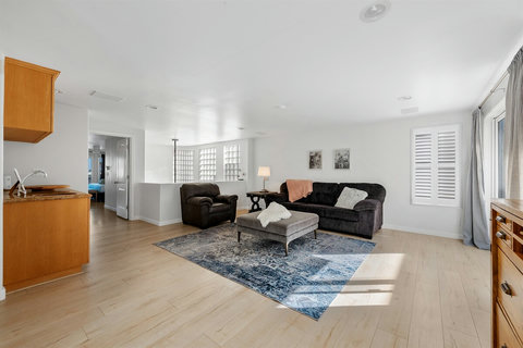 Third-floor family room with a sleeper sofa – a versatile space for extra guests