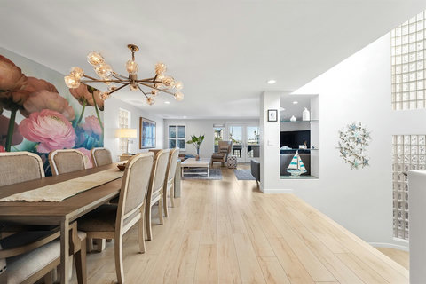 Open-concept flow from the entryway to the dining area and living room