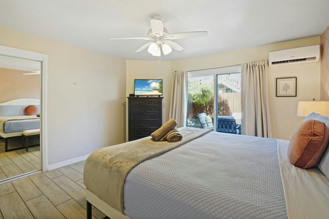 Ground Floor King Bedroom is spacious with 2 closets and door to patio