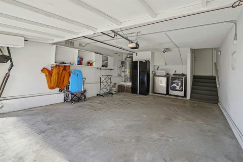 Garage: Laundry facilities and beach gear in the garage
