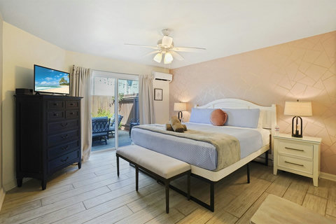 Ground Floor King Bedroom is spacious with 2 closets and door to patio