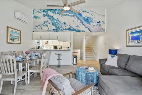 This isn't just a home; it's a hub for family and friends to come together. With plenty of inviting spaces, there's room for everyone to hang out and mingle. Extra chairs are always at the ready for when guests drop by.