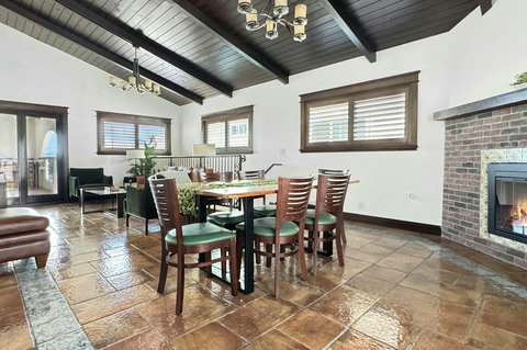 Dining area in open-concept living space, fireplace