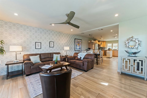 Smart TV & Fireplace Vibes Enjoy movie nights by the fireplace with a 50" smart TV. The perfect place to relax after a beach day.
