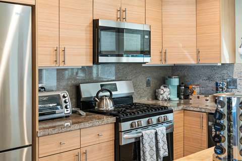Bright and Functional Kitchen Whip up snacks or full meals in this light-filled kitchen with plenty of counter space and all the essentials.