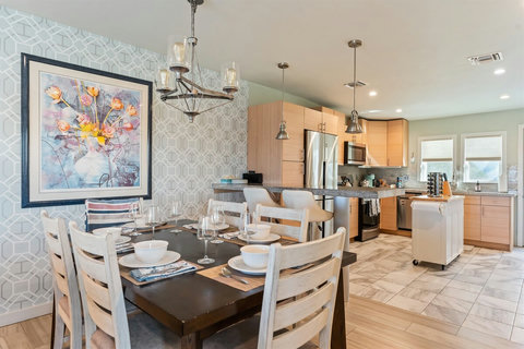 Dining Area for 8 Guests Gather for meals, games, or good conversation around the spacious dining table.