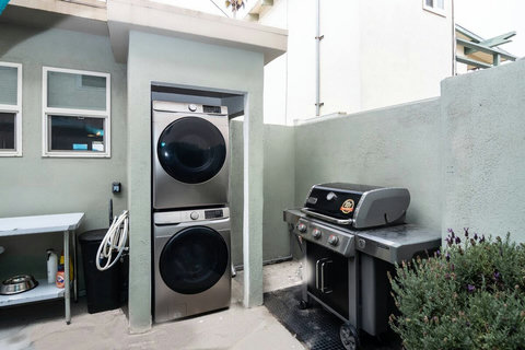 BBQ & Laundry Essentials, Ready to Go Fire up the gas grill for outdoor meals and keep your beach gear fresh with a full-size washer and dryer. We’ve even stocked the grill tools and cleaning supplies for you.