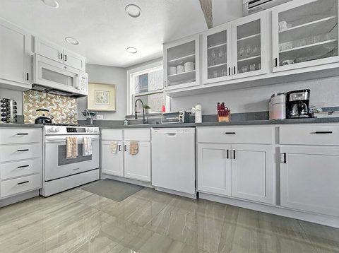 Brand new kitchen with granite counters and plenty of space to cook!