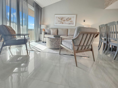 Remodeled living room with sofa sleeper