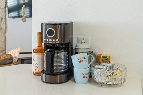 Spacious, fully stocked kitchen with everything you need—cookware, condiments, and a coffee station included!