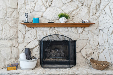 Cozy up by the gas fireplace in the second-floor living room—a perfect way to end the day.