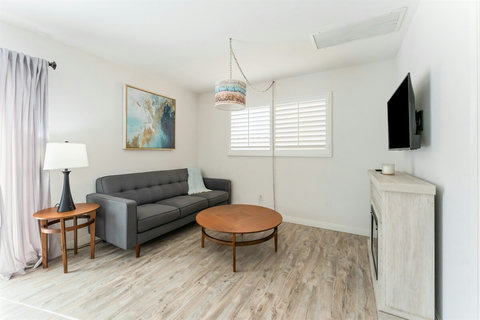 Ground Floor Living Room – Light-filled and welcoming, with space to lounge, read, or stream your favorite shows.