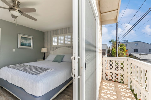 Second Floor King Bedroom – Spacious and serene with a plush mattress and plenty of natural light.
