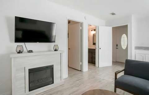 Ground Floor Living Room – Light-filled and welcoming, with space to lounge, read, or stream your favorite shows.