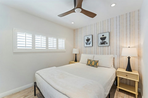 Second Floor Queen Bedroom – Updated, peaceful, and ready to help you unwind after a beach day.