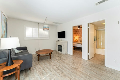 Ground Floor Living Room – Light-filled and welcoming, with space to lounge, read, or stream your favorite shows.