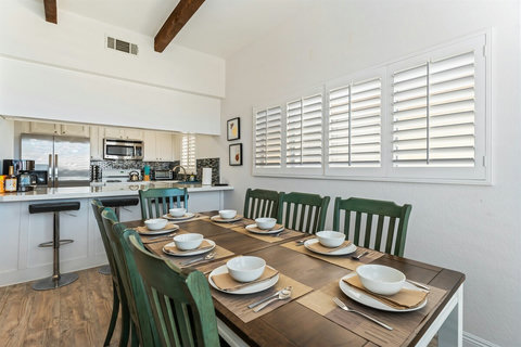 Dining area seats 8—perfect for family meals, games, or planning tomorrow’s adventure.