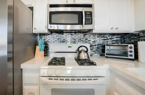 Spacious, fully stocked kitchen with everything you need—cookware, condiments, and a coffee station included!