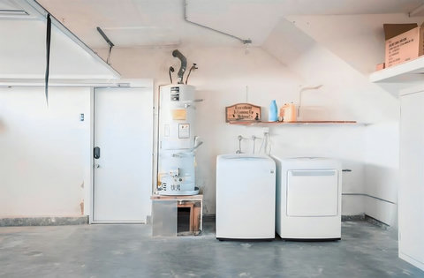 Washer and dryer in the garage—perfect for long stays or keeping beach towels fresh.
