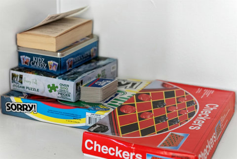 We try to keep a supply of games and books so you can have family board game night!