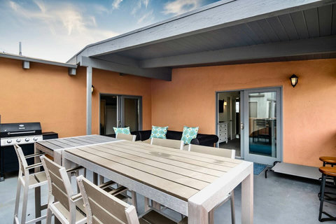 Entertain with Ease Host unforgettable outdoor gatherings with a BBQ grill, dining table, and lounge area, creating the perfect setting for family meals and celebrations.