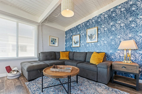 Water views from the living/dining room and kitchen areas and steps to the sand. Grab the wagon full of beach chairs or kayak!