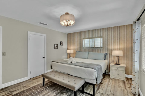 A serene retreat with a luxurious king bed, walk-in closet, Smart TV, and baby-friendly amenities—perfect for families traveling with little ones