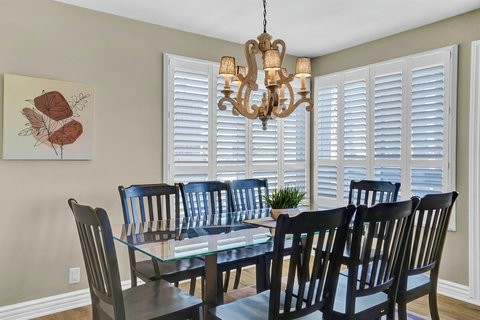 Share laughter and delicious meals around this spacious dining table, designed for both intimate dinners and lively group gatherings