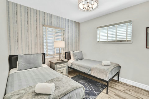 Perfect for kids or extra guests, this bright and airy twin bedroom offers a comfortable space to rest after a long day of beach adventures