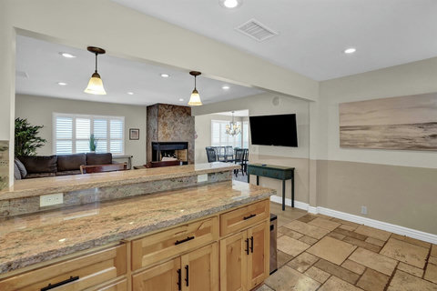 Everything you need to whip up a gourmet meal or a quick snack is right at your fingertips in this thoughtfully stocked kitchen.