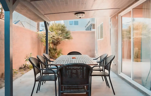 Enjoy al fresco dining on the private patio, complete with a gas grill and seating for 16 - we have added a second table to this set up.