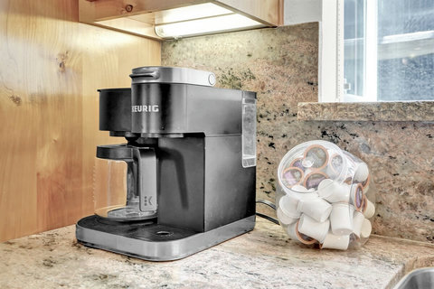Everything you need to whip up a gourmet meal or a quick snack is right at your fingertips in this thoughtfully stocked kitchen.