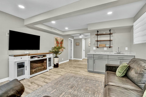 This multi-purpose space is perfect for lounging, watching TV, or setting up a cozy sleeping nook with the sofa sleeper. With direct access to the back patio, it’s ideal for guests who prefer ground-floor accommodations.
