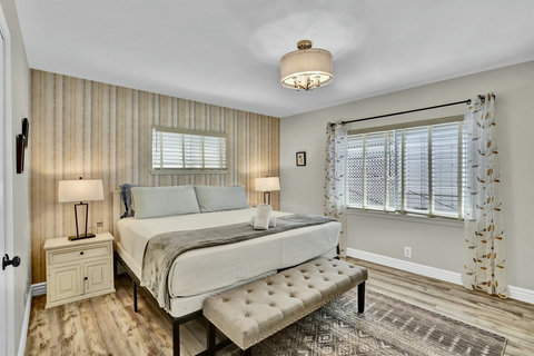 A serene retreat with a luxurious king bed, walk-in closet, Smart TV, and baby-friendly amenities—perfect for families traveling with little ones
