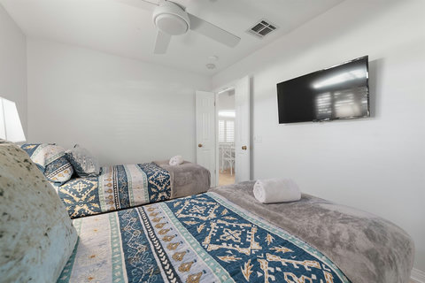Comfortable twin bedroom, perfect for kids or extra guests.
