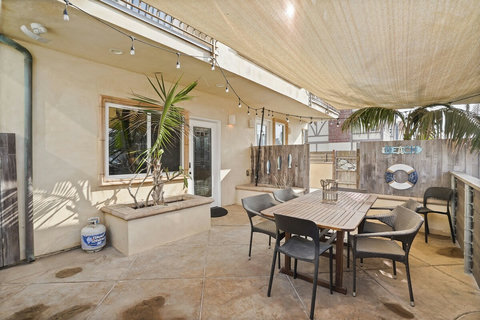 Enjoy al fresco dining with a grill on the front patio. Perfect for sunny lunches or dinner under the stars.