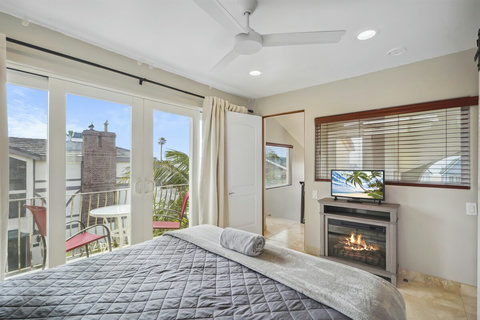 Another queen bedroom with scenic views and calming decor.