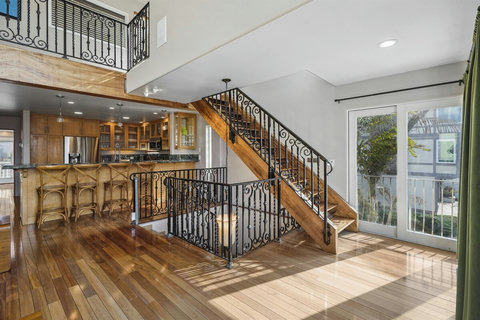 Head up to the third floor for two more bedrooms and a shared full bath.