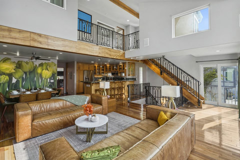 Third-story overlook adds architectural charm and a sense of grandeur.
