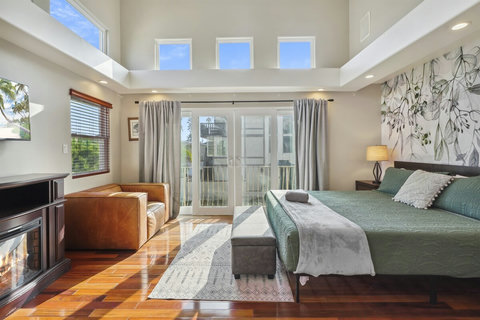 Soaring ceilings, plush king bed, and a Smart TV for streaming your favorites.